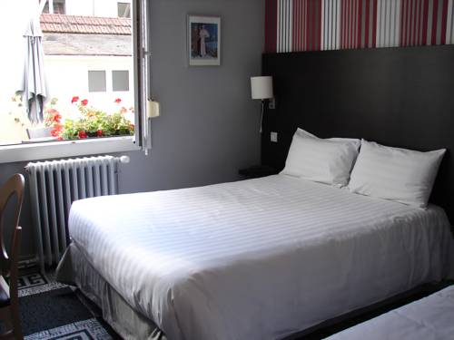 Imagen de la habitación del Hotel Le Charleston. Foto 13