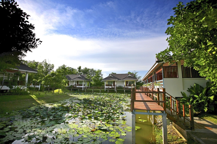 Imagen de los exteriores del Hotel Le Charme Sukhothai Historical Park Resort. Foto 13