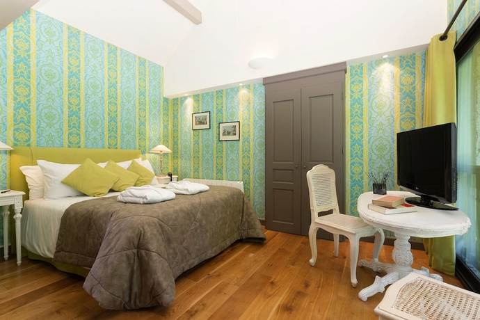 Imagen de la habitación del Hotel Le Chateau De Candie. Foto 11