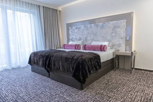 Imagen de la habitación del Hotel Le Chateau Des Thermes. Foto 13