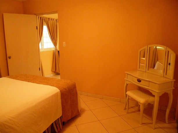 Imagen de la habitación del Hotel Le Chateau Ocean Villas. Foto 6