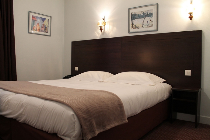 Imagen de la habitación del Hotel Le Chatel. Foto 10