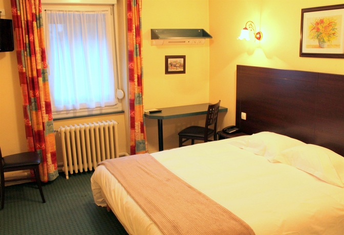 Imagen de la habitación del Hotel Le Chatel. Foto 14