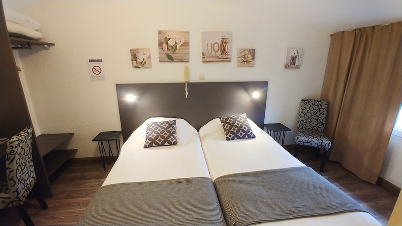 Imagen de la habitación del Hotel Le Cheval Blanc Cognac Centre. Foto 2