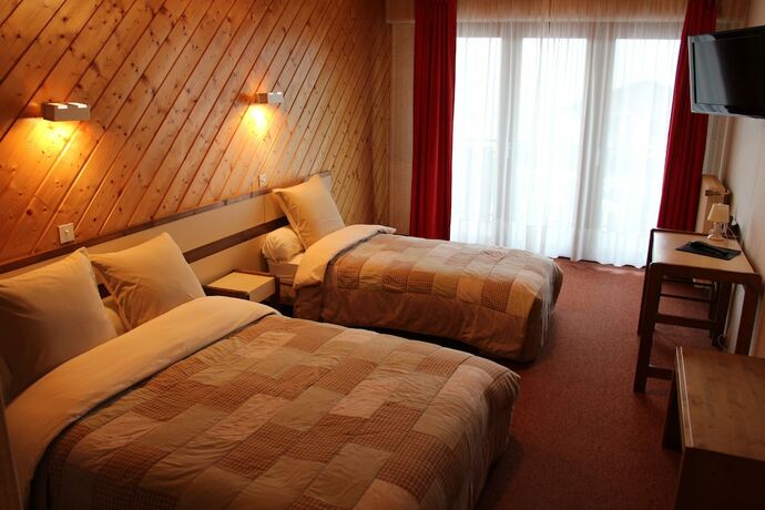 Imagen de la habitación del Hotel Le Christania. Foto 15