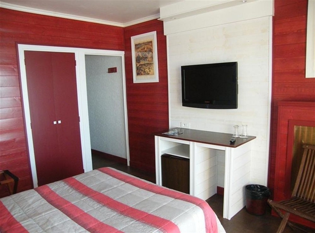 Imagen de la habitación del Hotel Le Christina. Foto 10