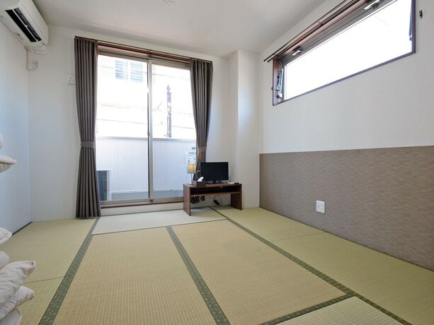 Imagen de la habitación del Hotel Le Ciel Kaizuka. Foto 7