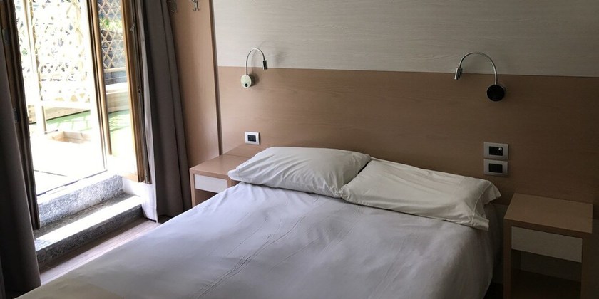 Imagen de la habitación del Hotel Le Cime. Foto 16