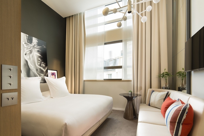 Imagen de la habitación del Hotel Le Cinq Codet. Foto 17