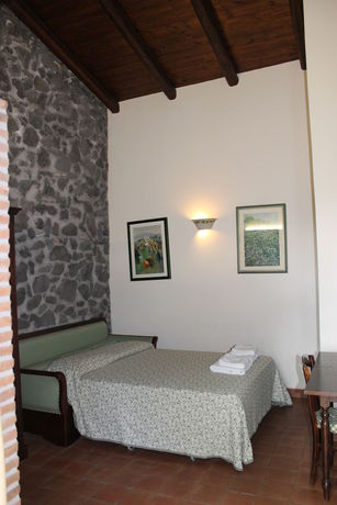 Imagen de la habitación del Hotel Le Cisterne. Foto 4