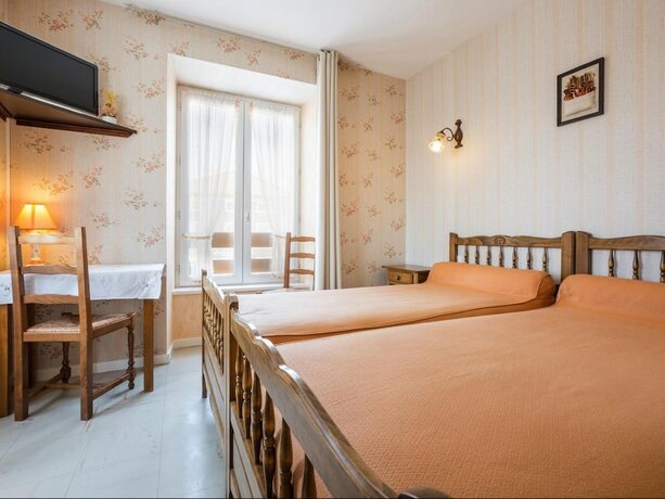 Imagen de la habitación del Hotel Le Clair Logis. Foto 18