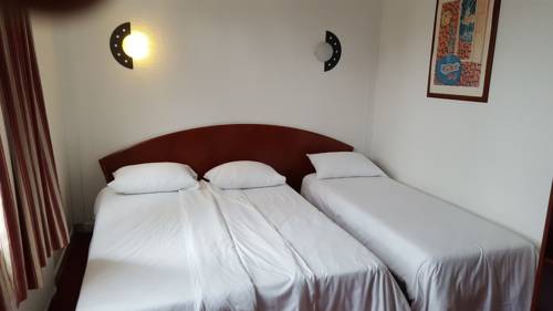 Imagen de la habitación del Hotel Le Clémenceau. Foto 2