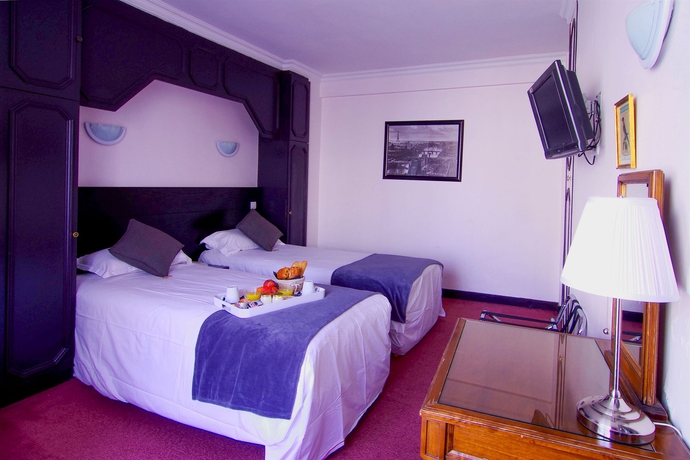 Imagen de la habitación del Hotel Le Clery Paris. Foto 11