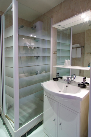 Imagen de la habitación del Hotel Le Clery Paris. Foto 12