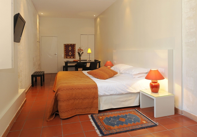 Imagen de la habitación del Hotel Le Cloitre St Louis. Foto 9