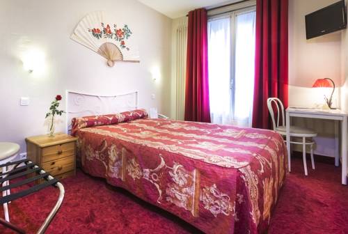 Imagen de la habitación del Hotel Le Clos D'alésia. Foto 5