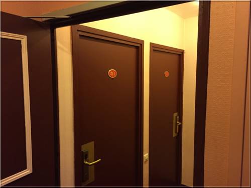 Imagen de la habitación del Hotel Le Clos D'alésia. Foto 6