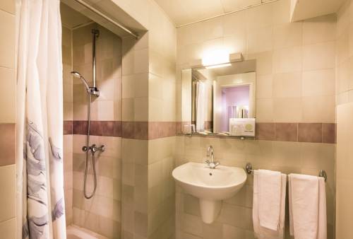 Imagen de la habitación del Hotel Le Clos D'alésia. Foto 13