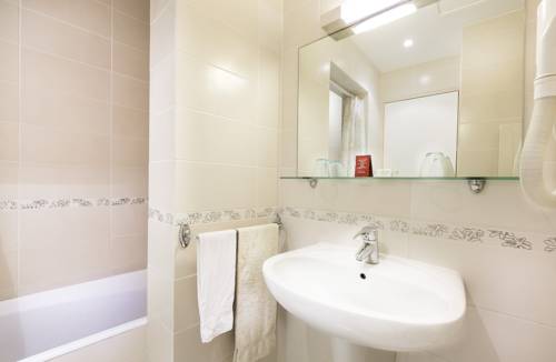 Imagen de la habitación del Hotel Le Clos D'alésia. Foto 14