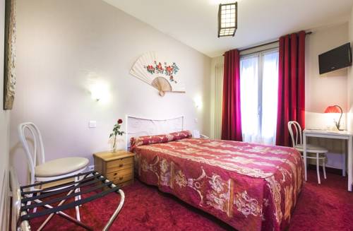 Imagen de la habitación del Hotel Le Clos D'alésia. Foto 16