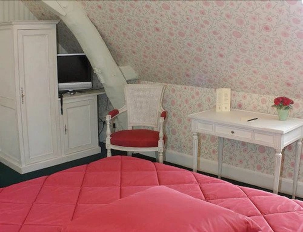Imagen de la habitación del Hotel Le Clos De Bourgogne. Foto 11