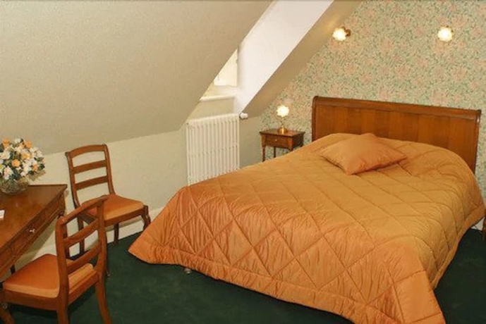 Imagen de la habitación del Hotel Le Clos De Bourgogne. Foto 13