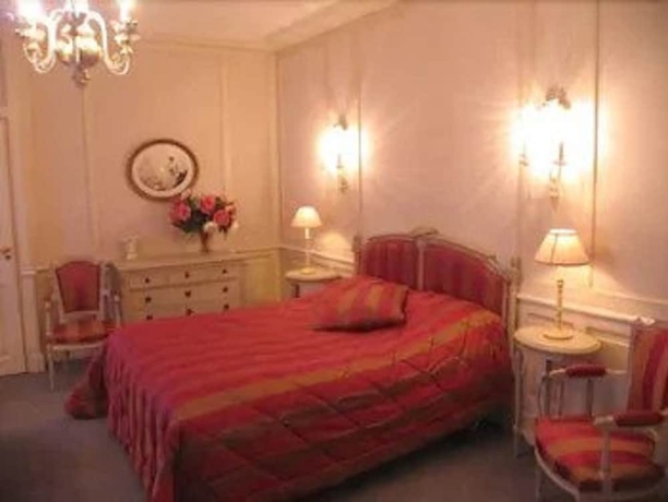 Imagen de la habitación del Hotel Le Clos De Bourgogne. Foto 16