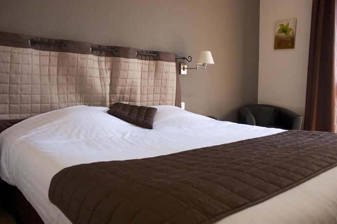 Imagen de la habitación del Hotel Le Clos De L'aube Rouge. Foto 3