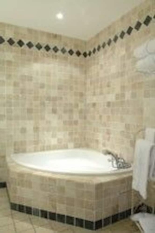 Imagen de la habitación del Hotel Le Clos De Pradines. Foto 15