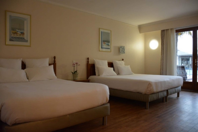 Imagen de la habitación del Hotel Le Clos Deauville Saint-gatien. Foto 8