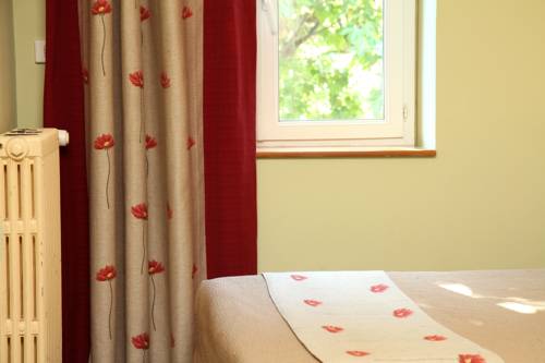 Imagen de la habitación del Hotel Le Clos Des Oliviers. Foto 4