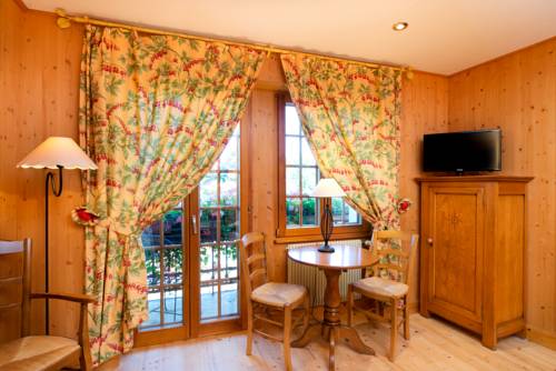 Imagen de la habitación del Hotel Le Clos Des Sources Hôtel & Spa. Foto 8