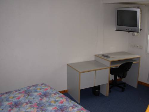 Imagen de la habitación del Hotel Le Clos Des Tanneurs. Foto 5