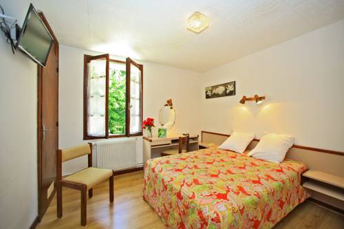 Imagen de la habitación del Hotel Le Clos Grand. Foto 4