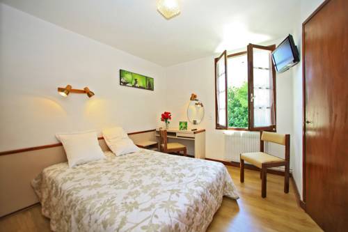 Imagen de la habitación del Hotel Le Clos Grand. Foto 9