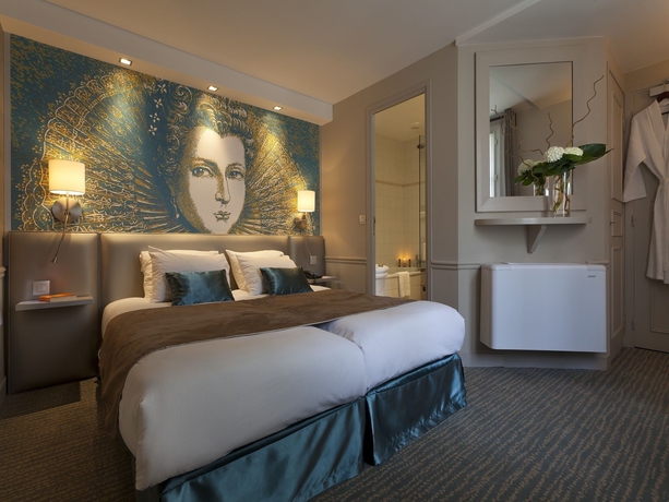 Imagen de la habitación del Hotel Le Clos Medicis. Foto 8