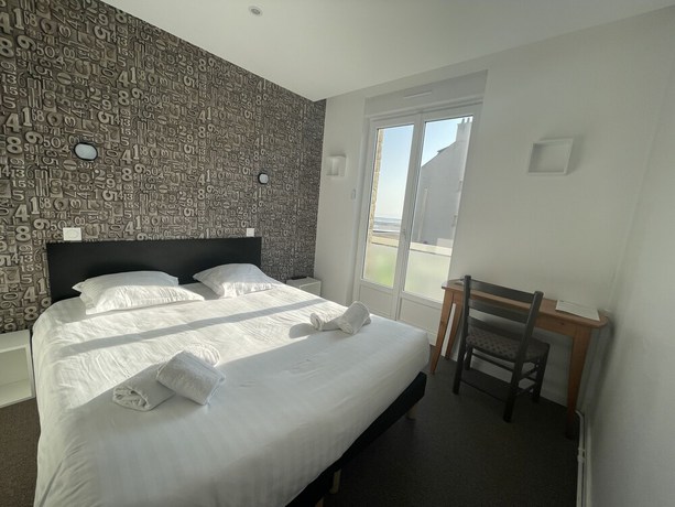 Imagen de la habitación del Hotel Le Clos Normand. Foto 3