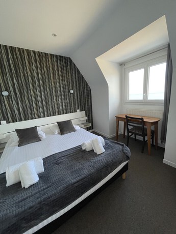 Imagen de la habitación del Hotel Le Clos Normand. Foto 17