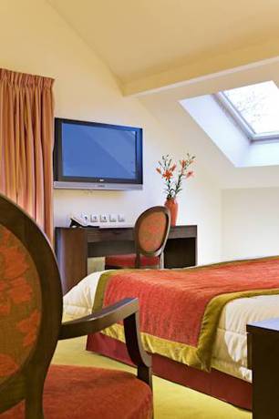 Imagen de la habitación del Hotel Le Clos Rebillotte, Luxeuil Les Bains. Foto 6