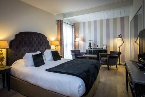 Imagen de la habitación del Hotel Le Clos Saint-martin and Spa. Foto 9