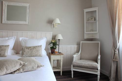 Imagen de la habitación del Hotel Le Clos Saint-martin and Spa. Foto 11