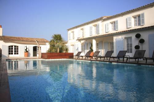 Imagen de la habitación del Hotel Le Clos Saint-martin and Spa. Foto 13