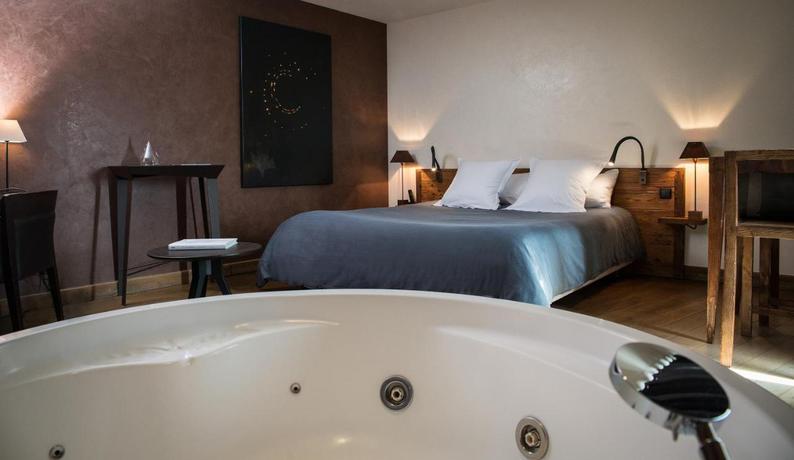 Imagen de la habitación del Hotel Le Clos des Sens. Foto 4