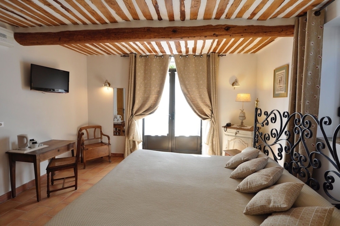 Imagen de la habitación del Hotel Le Clos du Buis. Foto 11