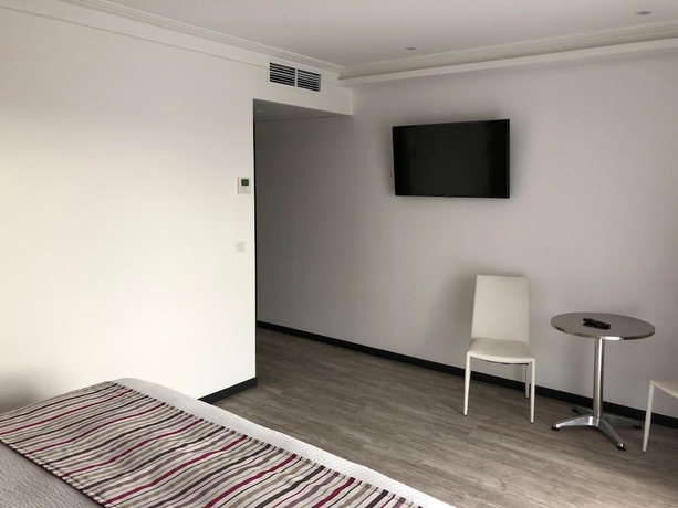 Imagen de la habitación del Hotel Le Clos du Moulin. Foto 13