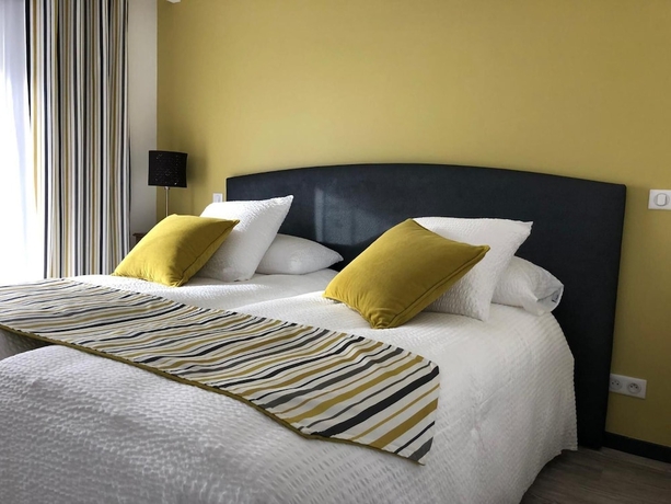 Imagen de la habitación del Hotel Le Clos du Moulin. Foto 14