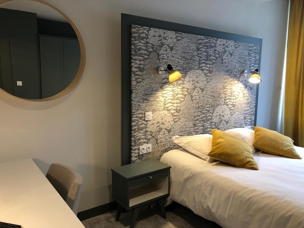 Imagen de la habitación del Hotel Le Cobh. Foto 12