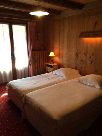 Imagen de la habitación del Hotel Le Coin Savoyard. Foto 15