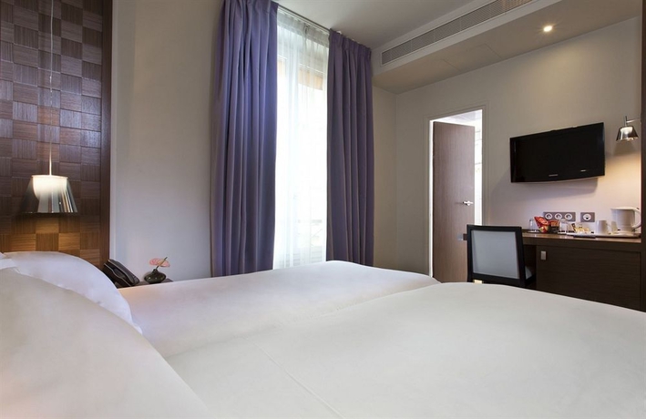 Imagen de la habitación del Hotel Le Colisee. Foto 6