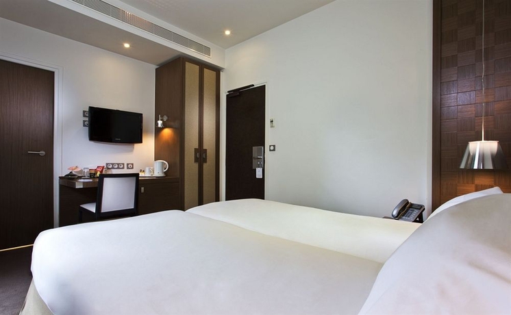 Imagen de la habitación del Hotel Le Colisee. Foto 7